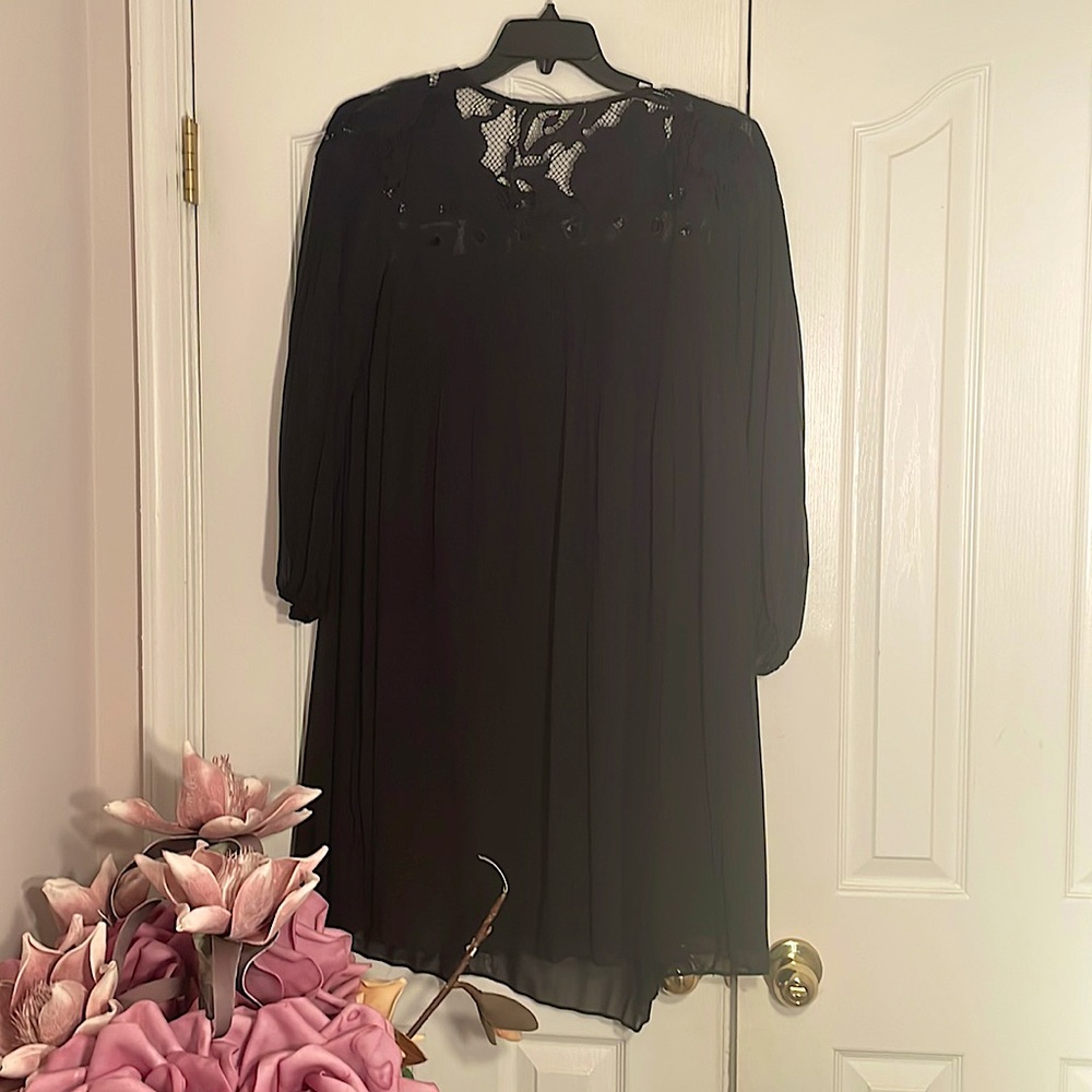 Gorgeous, versatile, black swing dress